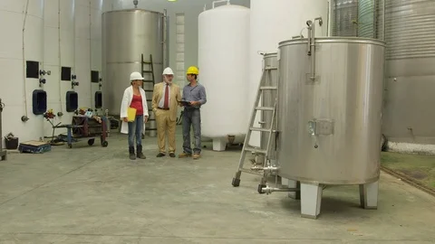 Talking, Working, Walking, Blue Collar Worker, Technician, Industry, Teamwork, Video stock 94025412