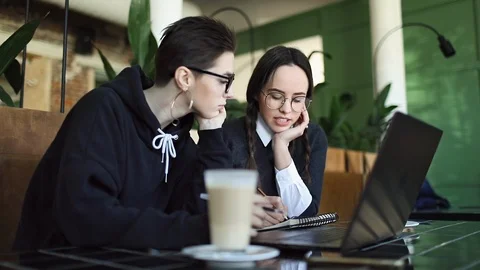 Talking Young Girls Working on Project 動画素材 103824545