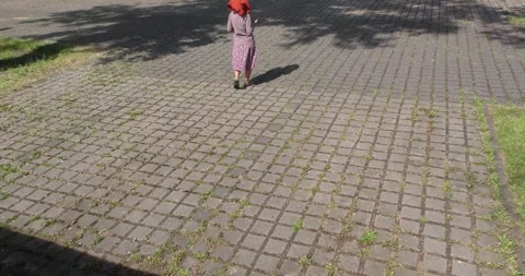 Talking to yourself in an empty parking lot Stock Footage 261157534