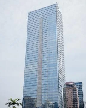 A tall and rectangular office building in Jakarta Stock Photos