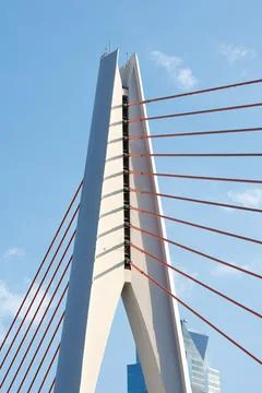 Tall angular cable?stayed bridge pylon with radiating red stay cables Stock Photos