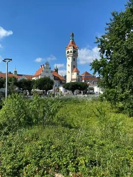 A tall building with a clock tower Stock Photos