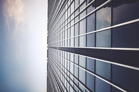 A tall building compounding an abstract shape full of squares Stock Photos