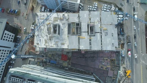 Tall building construction site. Cranes working on building Stock Footage 125367237