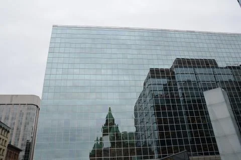 Tall building with windows and reflection in Ottawa Canada Stock Photos