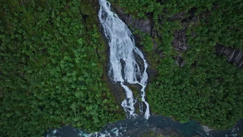 Tall cascading waterfall in remote Brattlandsdalen at Flesefossen, Norway. Stock Footage 328132891