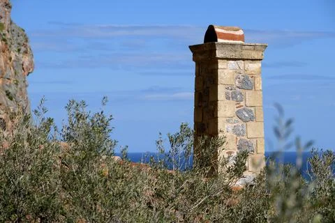 Tall chimney with medieval building Stock Photos