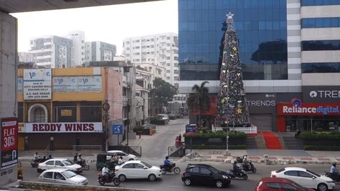 A tall Christmas tree in front of building in Hyderabad,India Stock Footage 83459549