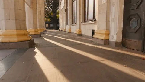 Tall columns. Beautiful light rays. Long shadows. Old building. Ukraine. Kiev Stock Footage 103425429