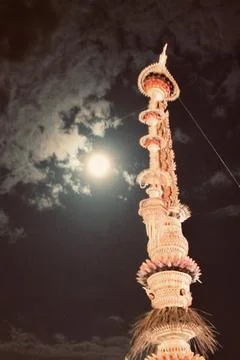 Tall Decorative Penjor Agung Under Full Moon at Karya Agung Panyegjeg Bhumi Ubud Stock Photos