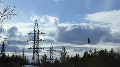 Tall Electric Masts Against Cloudy Sky. Time-Lapse. 4 к. Stock Footage 194049746