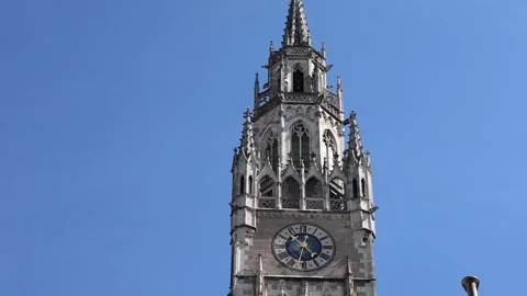 Tall Gothic Revival Munich Tower With Ornate Details And Large Clock Face Stock Footage 340445820