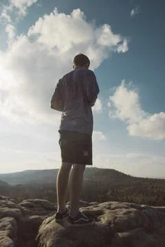 Tall guy on the mountain Stock Photos