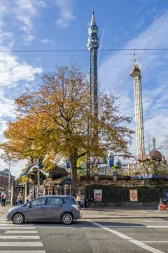 Tall metallic ride structures in the iconic Tivoli Gardens Amusement Park Stock Photos