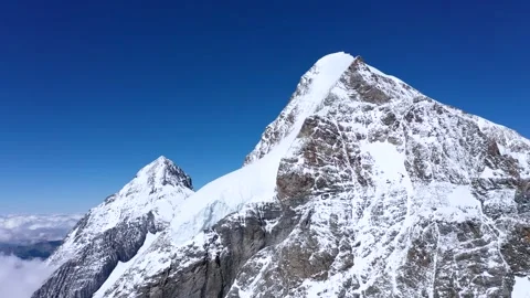 Tall Mountain Peak with snow Stock Footage 247797618