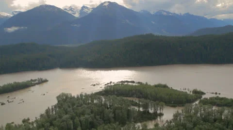 Tall Mountain Range Across River 動画素材 23026190