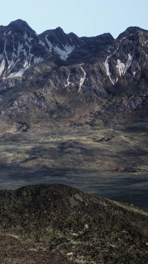 Tall mountains rise in the background while wide flat land stretches out below Stock Footage 340263968