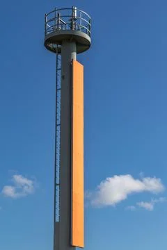 Tall navigation marker tower standing in Newcastle Harbour Stock Photos