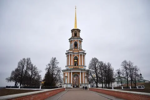 Tall old bell tower in cloudy weather Stock Photos