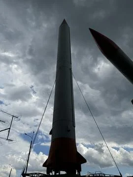 Tall Rocket Silhouette Under Dramatic Sky Stock Photos