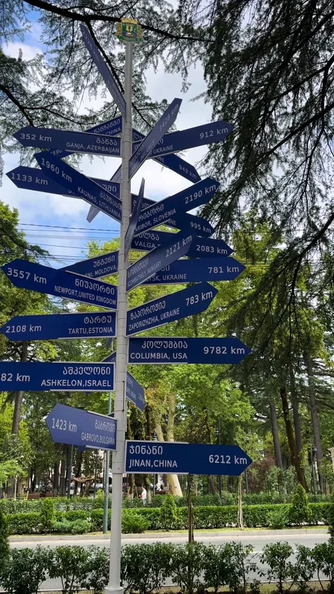Tall rustic modern pillar blue metal stand pedestrian intersection signpost Video stock 338315746
