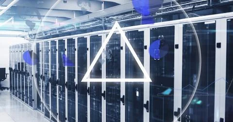 Tall server cabinets lining bright aisle with white triangle and circle Stock Photos