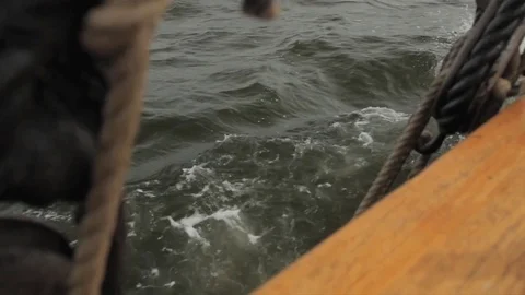 Tall-ship, Exploration boat, rigging, masts and giant sails at sea. Pirates. Stock Footage 81243092