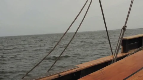 Tall-ship, Exploration boat, rigging, masts and giant sails at sea. Pirates. Stock Footage 81243237