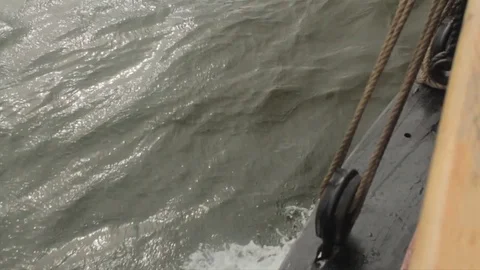 Tall-ship, Exploration boat, rigging, masts and giant sails at sea. Pirates. Stock Footage 81243411