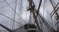 Tall ship Kruzenshtern close up tilt in Bremerhaven harbor dock at cloudy day 4k or 4k+ Resolution
