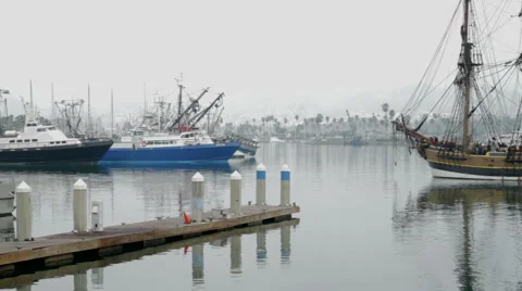 Tall Ship leaving the harbor in dense fog Stock Footage 49186053