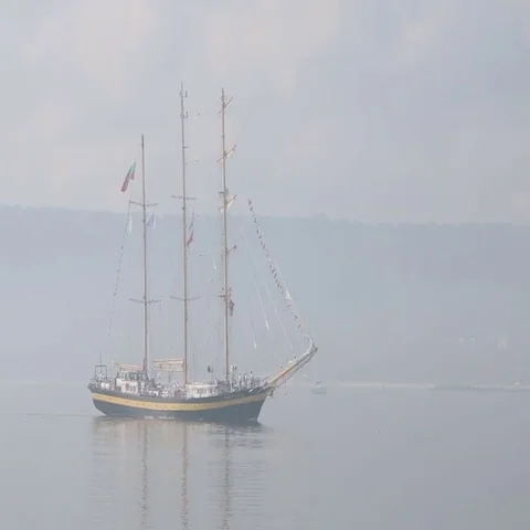 Tall ship sails on the open seas, misty foggy day Stock Footage 69548300