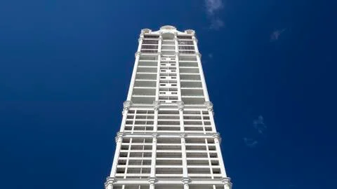 Tall skyscraper under deep blue sky Stock Photos