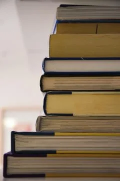 Tall stack of assorted books Stock Photos