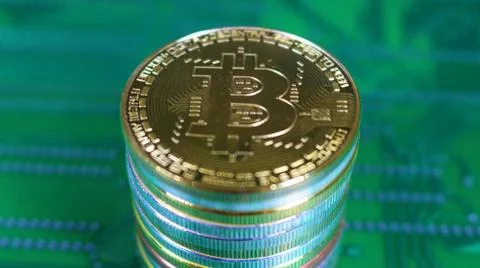 Tall Stack Of Bitcoins On Printed Circuit Board v2 Stock Photos