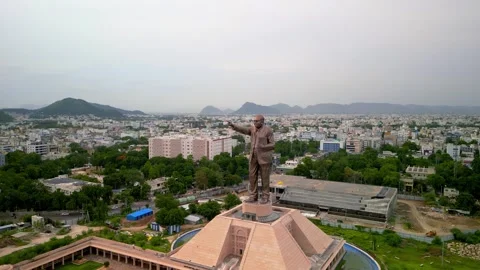 Tall statue of newly built Dr. B. R. Bhimrao Ramji Ambedkar holding Indian .. Video stock 313005402