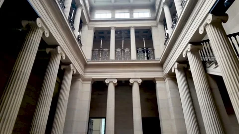 Tall stone columns and upper galleries rise around the interior courtyard of Stock Footage 339912819