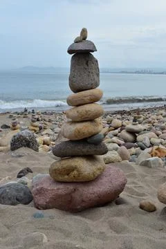 Tall Stone Stack on the Beach in Puerto Vallarta, Jalisco Stock Photos