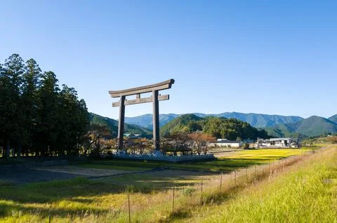 Tall torii gate overlooking fields in Wakayama Stock Photos