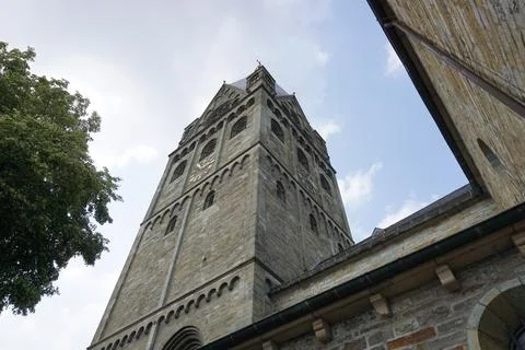 A tall tower with a clock on it Stock Photos