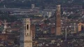 Tall towers of old cathedrals over houses of historical downtown, panorama shot HD Footage