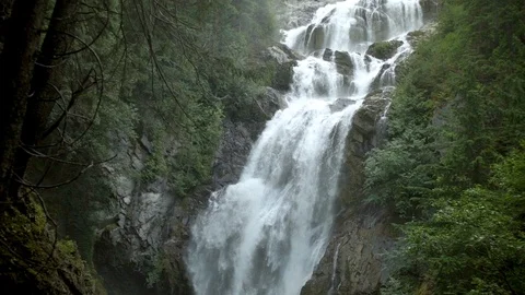 Tall Waterfall Flowing In Forest Stock Footage 120093664