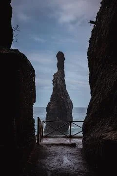 The tallest islet of Ribeira da Janela in Madeira island seen through the tunnel Stock Photos