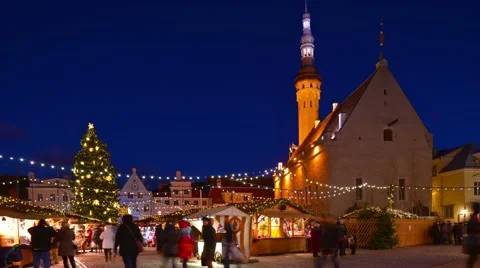 Tallinn, Christmas/New year time, fair Town hall square illuminated, time-lapse. Stock Footage