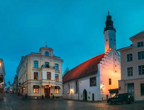 Tallinn, Estonia. Tower Of Church Of Holy Ghost Or Holy Spirit In Winter Evening Stock Photos