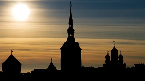 Tallinn at Sunset: Time Lapse with Colourfull sky and Silhouette of Old Town, Stock Footage 129184898