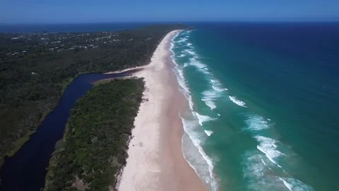 Tallow Beach And Tallow Creek In Byron Bay, NSW, Australia - Aerial Pullback Stock Footage 331335205