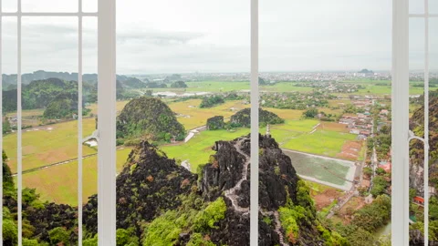 Tam Coc landscape as seen from a white window Stock Footage 140760140
