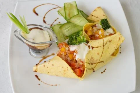 Tamale with roasted vegetables Stock Photos