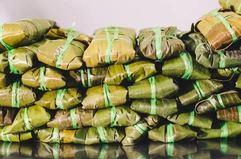 Tamales, a Peruvian dish made with corn dough, chicken or pork and chili Stock Photos